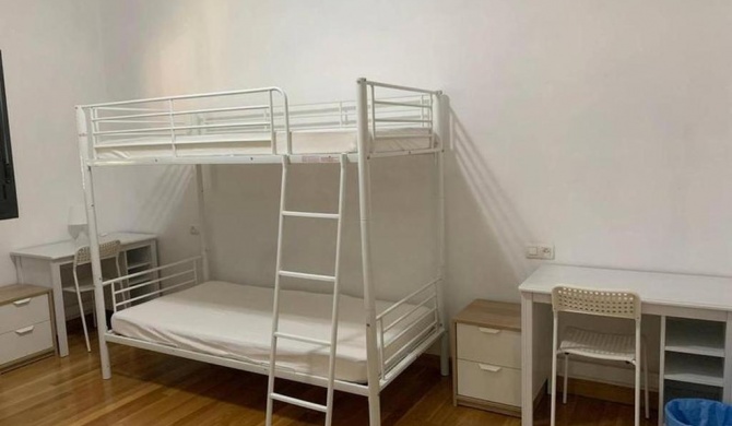 Double room with bunk beds for a relaxing stay
