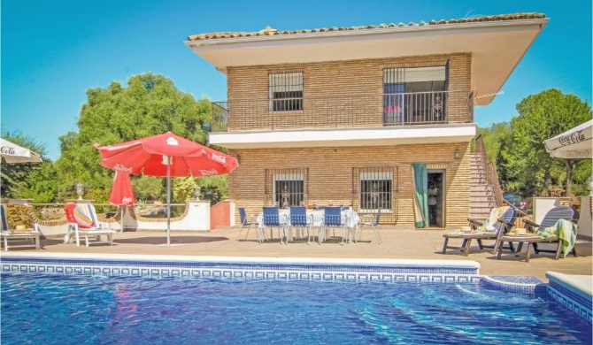 Awesome home in Almodvar del Ro with 5 Bedrooms, WiFi and Outdoor swimming pool